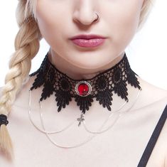 This choker combines the elegance of black venise lace with a beautifully ornate Ruby red pendant (26 x 22 mm), draped chains and a small central cross (20 x 10 mm).  The lace is finished off securely with an extender chain which allows the necklace/choker to be worn at any size from 13 to 15.5 inches. With the addition of an extender chain you can be sure of getting the fit you want and can choose between wearing the choker higher or lower on the neck.  This item can be made larger or smaller if required at no extra cost.  The Lucretia venise lace choker is available in Black Onyx, Sapphire blue, Emerald green, Deep purple and Ruby red.  There are three photos of the Emerald green Lucretia being worn. Gift wrapping All jewellery is beautifully presented and ready for gift giving, sprinkle Chains Cross, Gothic Choker Necklace, Multi Strand Pearl Necklace, Chunky Pearl Necklace, Gothic Choker, Necklace Ruby, Red Pendant, Gothic Chokers, Chunky Pearls