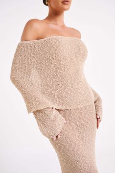 Wrapped up.MARISOL is a ribbed design dress made from a Boucle material that is both flattering from up close and across the room. The natural stretch of the fabric creates a figure-sculpting silhouette, while also featuring a unique drape-styled, off-shoulder neckline combined with flared long sleeves. Style yours with the Brandy Ankle Strap Heels to complete the look. FEATURES: Strapless neckline Long sleeve and overlay Elasticated top edge Soft boucle knit feel Unlined Maxi length FIT, FABRIC Boucle Material, Figure Sculpting, Boucle Knit, Sleeves Style, Crop Top Dress, Strapless Neckline, Design Dress, Ankle Strap Heels, Swimwear Accessories