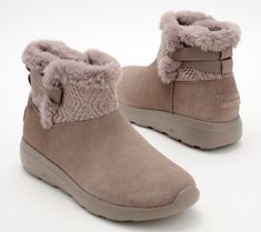 Cozy vibes only. But there's more to this snuggly lined Skechers boot than just warm and fuzzies! The go-everywhere suede shortie is water-repellent (take that, pop-up showers) and crafted with the brand's iconic Goga Mat insole. So whether you're walking the dog, dashing for dinner, or just padding around your pad, it feels like one big winter reset.  And did you notice the apres-ski style moment? Trend-right knit texture makes them a little different than the usual Skechers fare -- so you get Cozy Winter Boots With Plush Lining, Brown Casual Boots, Skechers Boots, Apres Ski Style, Ski Fashion, Everyday Shoes, Cozy Vibes, Winter Snow Boots, Skechers Shoes