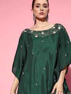 Buy endearing green dual tone floral embroidered kaftan kurta with dhoti pants for women which is crafted from silk blend fabric. This amusing style kurta set goes perfectly for upcoming festive season and grand events. Green Embellished Kurta With Traditional Drape, Embellished Green Kurta, Festive Zari Work Tunic Set, Green Kaftan With Resham Embroidery For Festive Season, Embellished Summer Kurta With Traditional Drape, Festive Designer Embroidered Top With Traditional Drape, Traditional Embellished Green Palazzo Set, Sets With Dupatta And Tunic Shape For Festivals, Tunic Sets With Dupatta For Festivals