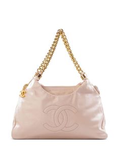 circa 2009 light pink satin logo charm signature stitched interlocking CC logo two chain-link shoulder straps partitioned compartment zip-fastening compartment Condition: GOOD. This previously owned and used item is in good condition with minimal signs of use. This may include fading of material or plating and scratches. Pink Vintage Bag, Vintage Makeup Products, Light Pink Bag, Pink Chanel Bag, Vintage Chanel Bag, Pink Bags, Shoulder Bag Pink, Chanel Logo, Pink Chanel