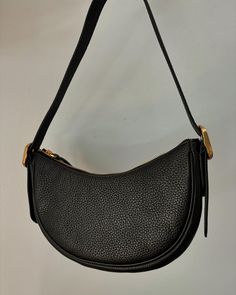 Handcrafted from super soft Italian leather, she's bringing a timeless look in a compact silhouette. Outfitted with an adjustable shoulder strap and zipper enclosure, this sleek carry-all has just enough space for all your essentials. Always fairly priced at $89.90. Timeless Textured Leather Crossbody Shoulder Bag, Everyday Timeless Leather Shoulder Bag, Timeless Leather Shoulder Bag For Everyday, Timeless Soft Leather Hobo Shoulder Bag, Timeless Everyday Saddle Bag With Adjustable Strap, Timeless Saddle Bag With Adjustable Strap For Everyday, Classic Soft Leather Baguette Bag For Travel, Daily Use Saddle Shoulder Bag With Gold-tone Hardware, Textured Leather Hobo Shoulder Bag For Work