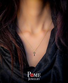 Love innovation? Looking for the new trend? Pome Jewelry is bringing renowned jewelers and enamelists together to create stunning and everlasting jewelry. We've taken fine jewelry and combined it with the art of enamel to produce eye popping pieces, adding much needed flavor to the traditional ways of jewelry. What are you waiting for? Differentiate yourself with this one of kind Dainty cross! A gift for either yourself, your significant other, or your family member - this dainty, yet elegant cr Affordable Silver Cross Pendant Jewelry, Elegant Jewelry With Adjustable Cross Chain, Elegant Cross Jewelry With Adjustable Chain, Elegant Black Enamel Round Pendant Jewelry, Dainty 14k Gold Cross Jewelry, Minimalist Rose Gold Cross Pendant Jewelry, Minimalist Rose Gold Cross Pendant, Elegant 14k Gold Necklace With Black Enamel, Elegant Black Enamel 14k Gold Necklace