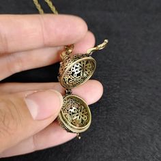 For More Similar Collection Check Out ! https://www.etsy.com/in-en/shop/CRAFTSHOPPYCo?ref=shop-header-name&listing_id=1471151035&from_page=listing&section_id=42071161 Vintage Brass Hollow Ball Locket Pendant Perfume Aromatherapy Essential Oil Diffuser DIY Necklace Keychain Ornaments Accessories For Craft. Diameter: 2cm Metals Type - Copper,Copper Alloy,Brass Material-100% Brass Use- Keychain, Locket , Pendant , Ball Decorative Spiritual Necklaces For Gifts, Bronze Adjustable Chain Necklace As Gift, Spiritual Decorative Necklaces For Gifts, Bronze Necklace With Adjustable Chain For Gift, Bronze Necklace With Adjustable Chain As Gift, Vintage Locket Necklace With Detachable Pendant For Gift, Antique Gold Filigree Necklace For Gift, Spiritual Locket Necklace With Adjustable Chain, Antique Gold Long Necklace Jewelry Gift