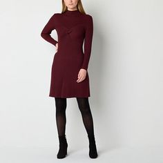 This Melonie T short sweater dress is an ultra-chic cozy essential for your fall and winter wardrobe. Made from a marled soft chunky knit in a wine hue, this fitted dress has a high mock neck, a twisted front and long sleeves. Wear it with boots and a jacket.Features: Stretch FabricClosure Type: Pullover HeadNeckline: Mock NeckSleeve Length: Long SleeveSleeve Style: Fitted SleeveApparel Length: 35 Inches - FrontDress Length: Short LengthFiber Content: 87% Rayon, 13% PolyesterFabric Description: Tweed Dresses For Women, Velvet Dress With Boots, Winter Dress With Boots, Dress With Tights And Boots, Dresses With Tights And Boots, Sweater Dress With Tights, Winter Dresses With Boots, Sweater Dress Outfit Winter, Burgundy Sweater Dress