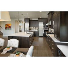 the kitchen is clean and ready to be used for dinner or other entertaining purposes in someone's home