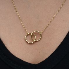 "We are offering a 20% DISCOUNT when you purchase 3 or more products from our store. Please use code 20PERCENTOFF at check out. This lovely gold toned interlocked circle necklace in stainless steel is presented on a card that says : \"Just for you\". The simplicity of this piece provides versatility and is perfect for that trendy layered look. The interlocked circles represent the unbreakable link between you and another. It is the perfect gift for a family member, best friend or significant oth Adjustable Necklace For Gift, Minimalist Stainless Steel Yellow Gold Necklace, Gold Plated Clavicle Chain Jewelry, Gold Plated Circle Jewelry With Delicate Chain, Gold Infinity Necklace For Gift, Minimalist Gold Plated Circle Jewelry, Delicate Gold-plated Chain Jewelry, Minimalist Stainless Steel Chain Necklace Gift, Modern Stainless Steel Chain Necklace For Gift