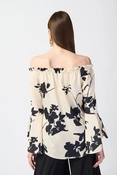 This printed floral top is the epitome of high-low fashion. Made from luxurious satin fabric, this piece features an elegant off-the-shoulder neckline and elastic shirring at the waist. Its long sleeves with ruffled cuffs elevate the top’s contemporary style. DETAILS & CARE 100% Polyester Satin Off shoulder Long sleeves with ruffled cuffs Unlined Hand wash in cold water with like colors Do not bleach Hang to dry in the shade Do not tumble dry Low iron only if needed Do not dry clean Wash garment Summer Long Sleeve Off-shoulder Top With Blouson Sleeves, Summer Off-shoulder Top With Blouson Sleeves, Spring Long Sleeve Off-shoulder Top For Brunch, Spring Brunch Long Sleeve Off-shoulder Top, Spring Off-shoulder Top With Blouson Sleeves, Chic Spring Off-shoulder Top With Blouson Sleeves, Chic Off-shoulder Top With Blouson Sleeves For Spring, Chic Off-shoulder Blouse With Blouson Sleeves, Off-shoulder Blouse With Blouson Sleeves For Fall