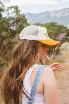 These trucker hats are our new favorites, and they will be yours too! Each style of hat has an adjustable band. Wear them with your hair down or up, and it will instantly make any outfit complete. This hat is white and orange with an adorable, embroidered vintage style Sedona, AZ desert scene on the front Western Style Summer Trucker Hat With Curved Brim, Western Style Trucker Hat With Curved Brim For Beach, Bohemian Trucker Hat, Western Beach Trucker Hat, Outdoor Distressed Trucker Hat, Desert Scene, White And Orange, Sedona Az, Hair Down