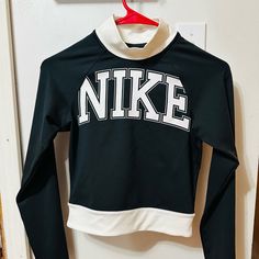 Brand New, Black And White Nike. Long Sleeve, Tight Fit. No Tags, But Brand New. No Rips Or Stains. Nike Crop Top, Black And White Nike, Black And White Nikes, Mock Neck Sweatshirt, Nike Pro Women, Nike Long Sleeve, Red Pullover, Comfy Clothes, Top Shirt Women