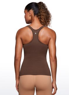 Seamless collection of smooth, breathable fabric is designed to help reduce chafing, encourage ventilation and wick away sweat to help you stay dry. Y-back and scoop neck gives you a stylish look. Built in shelf bra with removable pads provides extra support. Feature & Fitting: 
 Seamless collection 
 Design for yoga 
 Y-back 
 Built in bra & removable pads 
 Fabric: 
 Chafe-free, seamless construction 
 Sweat-wicking, soft ribbed textured fabric 
 Lightweight and stretchy 
 Body: 100% P Stretch Seamless Sports Bra With Scoop Back, Compression Seamless Tank Top For Yoga, Supportive Seamless Functional Tank Top, Seamless T-back Tank Top For Workout, Compressive Seamless Tank Top For Yoga, Compression Scoop Neck Top With Built-in Bra, Supportive Functional Tank Top With Seamless Construction, Seamless Compression Tank Top For Yoga, Seamless Compression Yoga Tank Top