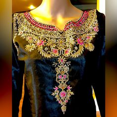 A Beautiful Black Pakistani Formal, Fancy 3 Piece Suit With Embroidered Shalwar And Finished Edges Duppatta. Satin Silk Fabric With Lining Underneath, Quality Work With Thread,Motives And Sequins.New Without Tag. Semi-stitched Embellished Embroidered Dress For Festivals, Embellished Semi-stitched Embroidered Dress For Festivals, Festive Bollywood Embellished Embroidered Dress, Traditional Embellished Embroidered Dress For Designer Wear, Black Embellished Kurta For Festive Occasions, Anarkali Dress With Gold Embroidery For Diwali, Gold Embroidered Saree Dress For Party, Diwali Anarkali Dress With Gold Embroidery, Eid Festive Dresses With Gold Embroidery