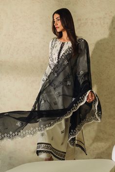 Brand: NeeshayCollection: Neeshay Monochrome Unstitched Summer CollectionFabric: Lawn DESIGN DETAILS: Embroidered Lawn Front 1 Piece Plain Lawn Back 1 Piece Embroidered Lawn Sleeves 0.66 Meter Embroidered Organza Front Border 1 Meter Embroidered Organza Sleeves Border 1 Meter Embroidered Khadi Net Dupatta 2.5 Meter Plain Dyed Cambric Trouser 2.5 Meter DISCLAIMER:* Lining, Laces, and Tassels are not included in unstitched variants.* Embellishment items in stitched outfits are subject to market av White Embroidered Palazzo Set For Wedding, Unstitched Off White Sharara With Embroidered Border, Designer Wear Unstitched Suit With Embroidered Border, Elegant White Anarkali Set With Embroidered Border, White Palazzo Set With Embroidered Border And Straight Kurta, Off White Embroidered Palazzo Set For Wedding, Wedding Off White Palazzo Set With Embroidered Border, Wedding Off-white Embroidered Palazzo Set, Unstitched White Palazzo Set