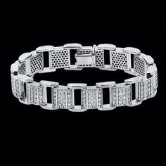 METAL SPECIFICATIONS Metal Name: White Gold 14K STONE SPECIFICATIONS Stone Name: DIAMOND Stone Cut : Round cut Stone Specifications: There are round diamonds total approx. 6.25 carats. Natural earth mined diamonds. Total Stone Weight : approx. 6.25 carats Color : F/G Clarity : VS1/VS2 BRACELET SPECIFICATIONS Length : 8" (Can change length, please indicate about change with payment) Appraised Value : $22248.00 Appraisal : Comes with a FREE APPRAISAL All kind of customization and options available Mens Link Bracelet, Bracelet White Gold, Mens Diamond Bracelet, Diamond Earrings Studs Round, Engagement Ring Photos, Ladies Diamond Rings, Round Diamond Engagement Rings, White Gold Diamond Rings, Diamond Charm