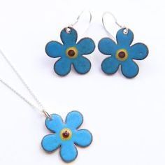 Blue Sterling Silver Necklace With Flower Charm, Blue Hypoallergenic Enamel Jewelry, Blue Enamel Hypoallergenic Jewelry, Hypoallergenic Blue Enamel Jewelry, Light Blue Flower-shaped Jewelry For Gifts, Light Blue Flower Shaped Jewelry Gift, Handmade Enamel Flower Jewelry, Blue Birth Flower Pendant Jewelry, Blue Flower-shaped Jewelry For Mother's Day