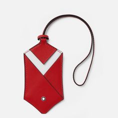 a red lanyard with a white arrow on it