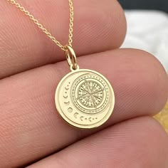 Dainty 14k Solid Gold Moon Compass Pendant, Personalized Moon Compass Necklace, Compass Moon Charm, Moon Necklace, Compass Gift 14k Solid Gold Choose What Size You Want the Pendant Using The First Option Box Choose If you Want Thinner, Thicker  Or Without Chain Using The Second Option Box Photos Are For The 0.5 inch Diameter Pendant Pendant thickness : 0.5mm  Contact us if you want it thicker Inner diameter of jump ring : 4mm Contact us if you need it bigger              No1 chain width : 0.87mm Luxury Elegant Medallion Necklace For Gift, Cheap Medallion Necklace For Gift, Luxury Elegant Necklace With Moon Phase, Celestial Compass Design Round Necklaces, Moon Phase Coin Necklace As Gift, Sun And Moon Design Charm Necklaces, Round Yellow Gold Charm Necklaces With Moon Phase, Yellow Gold Moon Phase Charm Necklaces, Yellow Gold Moon Phase Round Charm Necklaces