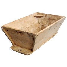 an old wooden box is sitting on a white background