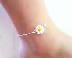 "Pretty little Daisy Anklet or Bracelet. The daisy is handcrafted to a 12mm size. The flower is along a delicate cable chain in a choice of 925 sterling silver or 14k gold filled.Choose from S-M-L-XL length. The Daisy is April's birth flower and a great gift idea for those with an April birthday. -Flower Size : 12mm -Chain : Choose 925 sterling silver or 14k gold filled cable chain View matching collection at: https://www.etsy.com/shop/strandedtreasures/search?search_query=daisy MEASURING GUIDE White Flower Jewelry For Birthday, White Flower Charm Jewelry For Birthday Gift, White Jewelry With Flower Charm For Birthday Gift, White Jewelry With Flower Charm As Birthday Gift, Dainty White Anklets Perfect For Gifts, Cute Flower Bracelets For Gifts, Cute Flower Shaped Bracelet For Gift, Summer Gift Jewelry With Flower Decoration, Summer Flower Decoration Jewelry Gift