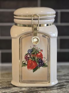 a white jar with a tag on it sitting on a counter