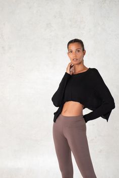 Made of soft Bamboo yarn, this knitted crop top is light and comfortable. Made in small batches   .... ❤ ❤70% BAMBOO / 30% CottonSee more beautiful long sleeves here : https://www.etsy.com/shop/SATICREATION?section_id=11291025&ref=shopsection_leftnav_8-------------Chantal, the model is 5'9" tall, she is wearing a size small.Her measurements are:bust: 33 inwaist: 25 inhips: 35 ininseem: 33.5 inchSizing Chart:XSMALL (0 - 2)body - 29 - 33 innatural waist 21 - 24 inSMALL (4 - 6)bust 32- 36 innat Fall Seamless Cropped Top, Stretch Soft Knit Cropped Sweater For Spring, Long Sleeve Seamless Crop Top For Loungewear, Seamless Long Sleeve Crop Top For Loungewear, Casual Textured Knit Cropped Sweater, Casual Textured Knit Stretch Cropped Sweater, Casual Stretch Textured Knit Cropped Sweater, Textured Knit Winter Crop Top, Chic Stretch Cropped Sweater In Soft Knit