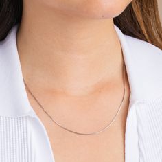 The perfect layering piece. We’ve offered customizable lengths so that this stunning box chain hits the perfect spot on your neck. Wear this chain solo for a sleek and simple look or add it to an assortment of other necklaces for that perfect golden base. Minimalist Curb Chain Necklace For Layering, Silver Snake Chain Necklace With Delicate Chain For Everyday, Dainty Herringbone Necklace With Box Chain, Dainty Everyday Herringbone Necklace With Box Chain, Dainty Snake Chain Necklace For Layering, Silver Minimalist Herringbone Necklace With Box Chain, Minimalist Snake Chain Necklace With Box Chain For Everyday, Minimalist Curb Chain Necklace, Classic Herringbone Necklace With Delicate Chain For Gift