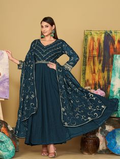 Introducing our "gorgeous teal blue embroidered georgette function wear anarkali suit," a stunning outfit that will make you stand out at any festival or function. This teal blue anarkali suit is made from high-quality georgette material, featuring intricate sequin and embroidered work that adds a touch of glamour and elegance to the ensemble.
This outfit includes a teal blue color georgette material anarkali suit with sequin and embroidered work, similar color crepe material pants, and a simila Blue Georgette Anarkali Set With Traditional Drape, Floor-length Blue Kurta With Mirror Work, Blue Anarkali Set For Eid, Blue Floor-length Kurta With Mirror Work, Blue Zari Work Anarkali Set Maxi Length, Blue Floor-length Georgette Kurta, Blue Anarkali Kurta In Georgette, Blue Floor-length Georgette Sharara, Floor-length Blue Georgette Sharara