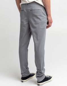 RSQ Mens Slim Taper Light Gray Chino. Cotton twill chino pants with stretch. Slant hand pockets. Back welt pockets with RSQ logo on left pocket opening. Tapered fit. Approx. inseam: 30". Approx. leg opening: 14". 97% cotton/3% spandex. Machine wash. Imported. Streetwear Bottoms With Welt Pockets And Straight Hem, Casual Stretch Gray Bottoms, Casual Bottoms With Hip Pockets, Casual Fitted Straight Work Pants, Casual Solid Work Pants With Hip Pockets, Casual Trousers With Hip Pockets, Fitted Casual Work Pants, Casual Straight Pants With Welt Pockets, Gray Fitted Casual Bottoms