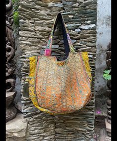 About bag  Indo-gypsy fusion, everyday use hand bag made from Banjara fabrics sourced from Vintage tribal costumes of regions of Rajastan and Gujarat. These are embellished with light catching coins, and intricate bead work tassels. Size - length 15 inches/ width 21 inches Company details:  Company name: Houseoftextile  Contact number: +919784447473  Email id: houseoftextile77@gmail.com  Shipping & custom : Delivery through one of the finest service providers : Skyway, Fedex, UPS  And DHL. Any l Email Id, Gmail Com, Hand Bag, Bag Making, Bead Work, Electronic Accessories, Tote Bag, Purses And Bags, Embroidery