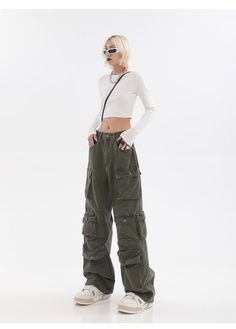 Green Cargo Style Wide-leg Parachute Pants, High Waist Winter Cargo Jeans, Green Wide Leg Pants For Streetwear, Green Full Length Parachute Pants For Fall, Green Full-length Parachute Pants For Fall, High-waist Cargo Jeans For Winter Streetwear, Baggy High Waist Military Pants, High Waist Cargo Jeans For Winter Streetwear, Military Style High Waist Baggy Pants