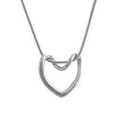 Celebrate love in all its forms with Chloe Heart Necklace. This captivating necklace features a delicate, hollow heart pendant, meticulously crafted from high-quality stainless steel with a timeless gold or silver finish.A perfect gift for yourself or a loved one, The Everlasting Love Necklace is a timeless reminder of the enduring power of love. Stainless steel with 18k PVD Gold or Sterling Silver Plating Delicate Hollow Heart Pendant Lightweight & Minimalist Adjustable Chain (16" + 2" Extender) Trendy Double Heart Metal Necklace, Trendy Metal Double Heart Necklace, Metal Charm Necklace With Heart Pendant And Silver Chain, Trendy Heart-shaped Silver Chain Necklace, Trendy Heart Shaped Silver Chain Necklace, Valentine's Day Silver Stainless Steel Chain Necklace, Trendy Everyday Metal Heart Necklace, Elegant Open Heart Stainless Steel Jewelry, Trendy Heart Pendant Necklace With Silver Chain