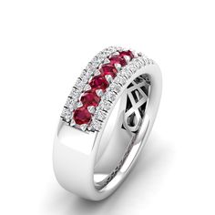 This stunning wedding ring features vibrant red diamonds set in elegant gold, creating a timeless and luxurious piece of jewelry that symbolizes love and commitment. The striking contrast between the deep red diamonds and the bright gold makes this ring a unique and eye-catching choice for any bride or groom. Metal: 14K Gold Setting Type: Prong Rhodium Finish: Yes, on White Gold Gemstone Details: Gemstone: Ruby Shape: Round Average Dimensions: 2.50 MM Quantity: 07 Average Cut: Very Good Average Elegant White Gold Ruby Ring With Half Eternity, Classic Ruby Ring With Diamond Cut, Luxury Red Diamond Ring With Accent Stones, Red Diamond Ring With Accents In Fine Jewelry Style, Red Diamond Ring With Diamond Accents, Red Diamond Ring With Accents, Round Cut, Fine Jewelry Red Diamond Ring With Accents, Red Ruby Wedding Rings With Diamond Cut, Red Formal Rings With Accent Stones