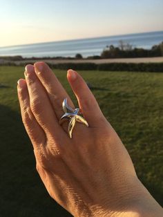 A  comfortable sterling  silver  Starfish ring made by hand .  You can wear it everyday , a special design for those who loves the sea and the seashells .  The length of the Starfish is approximately 3 cm ( 1.18 inch) The jewelry is coming with a free packaging Beach Sterling Silver Ring, Sterling Silver Beach Ring Jewelry, Sterling Silver Beach Ring, Ocean-inspired Silver Rings For The Beach, Silver Starfish Jewelry For Beach, Unique Starfish Jewelry As A Gift, Ocean-inspired Sterling Silver Jewelry With Starfish Charm, Handmade Silver Rings With Ocean-inspired Style, Ocean-inspired Sterling Silver Starfish Jewelry