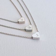 "Sterling Silver Heart Bracelet Delicate Heart Bracelet Tiny Heart Bracelet Bridesmaid Gift Minimalist Jewelry Initial Bracelet A delicate Sterling silver heart bracelet with your choice of initial stamp on it. This Bracelet makes a perfect gift for, birthdays, anniversaries and graduations. You can also present these as gift to your bridesmaids, sorority sisters and best friends in a cute gift box that will adore and appreciate! We put a tremendous attention to details, in order to make each pi Minimalist Stainless Steel Heart Bracelet As Gift, Minimalist Stainless Steel Heart Bracelet, Minimalist Silver Heart Bracelet In Stainless Steel, Heart-shaped Stainless Steel Bracelet For Mother's Day, Minimalist Heart Beads Jewelry For Mother's Day, Minimalist Jewelry With Heart Beads In Double Heart Shape, Mother's Day Heart Charm Minimalist Bracelet, Adjustable Minimalist Heart Necklace, Mother's Day Minimalist Heart Charm Bracelet