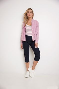 Do you sometimes wish you could enjoy the summers in a casual look, but think it may not be dressy enough for the office? These dressy straight leg capris are made just for you. They are roomy and comfortable enough to feel the soft breezes, and elegant enough to pair up with all your formal tops. Their chic details such as the pressed leg and nautical-inspired buttons add flair to your outfits, making them a summer must-have. Contoured waistband and back darts for perfect fit Tonal buttons at t Casual Knee-length Cargo Pants, Summer Workwear Straight-leg Capris, Casual Spring Bottoms For Workwear, Trendy Cotton Capris For Work, Cotton Capris For Spring Workwear, Casual Pants For Spring Day Out, Casual Spring Pants For Day Out, Versatile Straight Leg Capris For Spring, Trendy Bottoms With Straight Hem For Summer