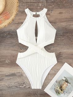 Elevate your poolside style with our elegant Cut Out Waist Halter One Piece Swimsuit. This plain yet sophisticated swimsuit features a high neck and chic cut-out waist, complemented by a backless design and ruched details. The bikini bottom type and wireless bra provide a comfortable fit, while the high-stretch fabric and removable padding ensure customizable support. Perfect for lounging in style, this swimsuit is recommended for poolside use and is not water-resistant. 95% Polyester, 5% Elasta Poolside Style, Swimsuit For Body Type, Backless One Piece Swimsuit, Poolside Fashion, Swimsuits Outfits, Perfect Swimsuit, Swimwear High Waisted, Swimsuit Sale, Swimsuit Design