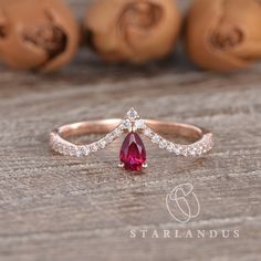 Natural Ruby Engagement Ring Pear Shaped Rose Gold Engagement Ring Dancing Ring Crown Queen Cluster Ring Red Curved Chevron Band Unique * Ring Material: solid 14k rose gold * Center Stone: Natural Ruby, about 0.2ct pear cut * Side Stone: Moissanite or Natural Diamonds, about 0.18ct * Band width: 1.6mm 2-3 WEEKS PROCESSING TIME MADE IN US * Shipping * FREE SHIPPING WITHIN USA! * Certificate * All the items will come with the certificate by me. * Shop Service * √ Free engraving(Up to 20 letters in Rose Red Rings For Wedding On Valentine's Day, Elegant Rose Red Wedding Rings, Red Teardrop Wedding Rings, Rose Gold Pear-shaped Ruby Jewelry, Ruby Ring Designs Unique, Ruby Engagement Ring Gold, Ruby Ring Designs, Stone Ring Design, Pear Ring