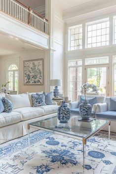 a living room with blue and white furniture