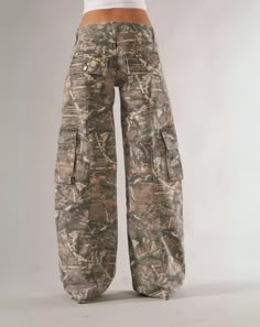 Embrace the call of adventure with our Camo Cargo Pants. Combining outdoor durability with urban style, these pants are perfect for any setting. Featuring a camo pattern and ample pocket space, you'll be ready for anything the day brings. Stay comfortable and stylish on all your journeys. Features: Wide Size Range High-Quality Material Multiple Utility Pockets Enhanced Construction Comfortable Fit Camouflage Design Durable Fabric Versatile Aesthetic Size Chart (inches): Size Waist Hip Length S 2 Combat Cargo Pants With Functional Pockets For Outdoor, Combat Style Cargo Pants With Functional Pockets For Outdoor, Tactical Outdoor Pants With Pockets, Tactical Cargo Pants With Side Pockets For Outdoor, Combat Pants For Outdoor Activities With Functional Pockets, Combat Cargo Pants For Outdoor Activities, Combat Pants With Cargo Pockets For Outdoor, Combat Style Outdoor Pants With Hip Pockets, Outdoor Combat Cargo Pants