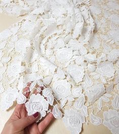 Beautiful Quipure Rayon lace fabric This is a new style in  high quality.  Great for wedding dress, evening gown, Costume, cocktail dress Color: White Width - 51inches, Length - by Yard Wholesale acceptable, please convo me Shipping Time: United Sates: 10-15 working days United Kingdom:10-15 working days Canada: 10-15working days Australia: 10-15 working days Asia:4-8 working days Europe: 10-20 working days need express mail service , please contact us Lace Patchwork Fabric For Wedding, Crochet Lace Fabric For Wedding, White Lace Fabric For Wedding, White Lace Wedding Fabric, White Lace With Floral Embroidery Fabric, White Wedding Fabric With Lace Work, White Lace Fabric, Sewing Wedding Dress, Floral Wedding Dress