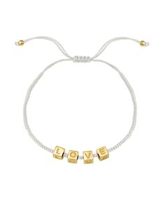 The epitome of laid back sophistication wrapped around your wrist, the Alpha Block Bracelet is going to become your go to bracelet for every wrist stack. Handcrafted and strung together with 18k gold vermeil, 18 rose gold vermeil or 925 Sterling Silver alphabet block beads nestled in the center, you can choose up to 8 letters to reflect the people who are most special to you. The uncomplicated design can be worn solo, or would look great stacked, or mixed and matched with your other favorite Mag Resizable Gold Wrap Bracelet As Gift, Adjustable Gold Wrap Bracelet For Everyday, Adjustable Gold Minimalist Wrap Bracelet, Gold Bracelets With Sliding Knot For Friendship, Gold Sliding Knot Friendship Bracelet, Gold Hand-strung Wrap Bracelet Gift, Adjustable Yellow Gold Braided Bracelet For Everyday, Gold Hand-strung Friendship Bracelets As Gift, Gold Hand Wrapped Friendship Bracelets As Gift