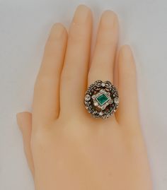 Art Deco Ring, Genuine Emerald Ring, Natural Diamond Ring, May Birthstone & 14K White Gold c.1920, Elegant Ring, Vintage Ring. This stunning estate ring is finely crafted in solid 14K White Gold and set with genuine Earth mined natural emerald and genuine diamonds. The center bezel set Emerald measures 5mm x 4.5mm (about .35ct). This is a very clean and transparent emerald with amazing intense green color with Natural inclusions. There are 56 natural diamonds in this ring for the total weigh Art Deco Green Emerald Ring With Rose Cut Diamonds, Art Deco Emerald Ring With Rose Cut Diamonds, Art Deco Emerald Jewelry With Rose Cut Diamonds, Antique Green Ring With 17 Jewels, Art Deco Emerald Ring With 17 Jewels, Antique Emerald Cut Emerald Ring With Center Stone, Victorian Style Collectible Emerald Ring, Victorian Emerald Ring For Formal Occasions, Art Deco Emerald Ring Collectible