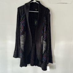 Long Line Open Cardigan With Embroidery Length 32 Inches Black Bohemian Knit Outerwear, Bohemian Black Knit Outerwear, Black Bohemian Knit Cardigan, Black Bohemian Sweater For Fall, Bohemian Black Sweater For Fall, Fall Bohemian Black Sweater, Embroidered Black Cardigan For Fall, Black Embroidered Cardigan For Fall, Black Embroidered Long Sleeve Cardigan