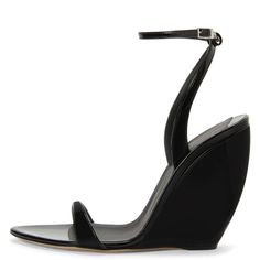 Elevate your style with these chic Black Patent Leather Wedge Sandals. Featuring an open-toe design and ankle strap, they offer both comfort and sophistication for any occasion. Color: Black Material: Patent leather Heel Type: Wedge heel Heel height: 4.13" / 105 mm approx Product measurements were taken using size 8. Please note that measurements may vary by size. The sandals are crafted from black patent leather material. With a matching covered curved wedge, and a matching adjustable ankle strap. Toe: Open toe Handcrafted US sizing. Fits true to size. Chic Wedge Sandals With 4-inch Heel And Open Toe, Chic 4-inch Heel Open Toe Wedge Sandals, Luxury Wedge Sandals With Wrapped Heel And Ankle Strap, Black Wedge Sandals With Heel And Ankle Strap, Black Open Toe Wedge Sandals With Heel Strap, Luxury Summer Wedge Heels, Elegant Summer Wedge Sandals With Single Toe Strap, Luxury Summer Wedge Sandals With Block Heel, Luxury Wedge Sandals With Ankle Strap And Heel Loop