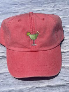 Margarita embroidery Baseball Cap Beach Hat in our popular adams brand pigment-dyed with the faded lived in or vintage look.  A summer must have and a perfect monogrammed gift for any occasion!  Bridesmaids Wedding Party Gifts, Graduations, Birthdays, and Christmas too. Create Your own vacation souvenir hat. Convo with your request. Additional fee may apply.  Margarita Size Options 1.00″x1.04″ 1.49″x1.57″  2.00″x2.11″      Fabric: 100% garment washed cotton twill     Structure: Unstructured, 6-p Red Summer Dad Hat, Red Summer Dad Cap, Summer Red Dad Cap, Red Curved Brim Dad Hat For Summer, Red Casual Dad Hat For Summer, Casual Red Dad Hat For Summer, Green Baseball Cap For Vacation, Vintage Summer Dad Hat One Size, Summer Brimmed Hats With Embroidery