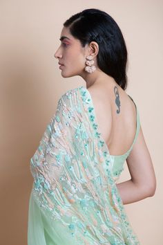 Editor's Note Featuring a neo mint hand-embroidered silk organza saree. This comes with matching blouse unstitched piece in chanderi and matching underskirt fabric in shantoon. Color: Mint Fabric: Silk Organza Length: Saree Length: 5.5m; Blouse Fabric: 1m Care: Dry Clean Only About the Designer Saksham & Neharicka make modernizing Indian wear with rich handwoven textiles, fresh intricate textures, chic and classic silhouettes, Saksham & Neharicka handcraft all designs to eternal perfection. Thei Mint Fabric, Saree For Women, Green Saree, Hand Woven Textiles, Organza Saree, Silk Organza, Fabric Silk, Green Silk, Blouse Fabric