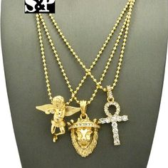 Brand New Hip Hop Celebrity Style Pendant & Chain 14k Gold Plated Size: Angel: 1.2" X 1.25", Lion : 0.85" X 1.5", Ankh Cross: 0.75" X 1.6" Chain: 2mm 24" Ball Chain Cz Stones On Pendant High Quality & Polished Gold-tone Rope Chain Jewelry, Gold Plated, Gold-tone Gold-plated Rope Chain Jewelry, Gold Plated Box Chain Pendant Jewelry, Gold Plated Rope Chain Pendant, Gold Rope Chain Jewelry As A Gift, Gold Plated Pendant Jewelry With Rope Chain, Gold Round Pendant Necklace With Rope Chain, Spiritual Pendant Jewelry With Rope Chain, Gold Pendant Charm Necklace With Rope Chain