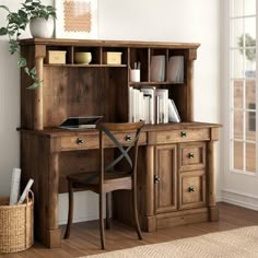 a wooden desk and chair in a room