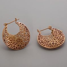 "Large Filigree Earrings Cambered earrings with uneven geometric cut out shapes in various sizes. These are a perfect unique piece of style for night and everyday wear. ▸▸ Size◂◂ - Diameter: 3.7cm - Earring length: 4.2cm - Approx weight of one earring: 5.6g - Finish: brushed - also available in a smaller size: http://etsy.me/1XeIEj0 ▸▸ Materials ◂◂ - Sterling Silver 925 - 18k Gold Coating - ear wire and clasp are sterling silver, earrings are brass - all together is coated with high quality 18k Gold Hoop Earrings With Pierced Copper, Brass Filigree Hoop Earrings, Bronze Hoop Pierced Earrings, Brass Filigree Hoop Earrings For Wedding, Elegant Copper Hoop Jewelry, Elegant Handmade Copper Hoop Earrings, Pierced Copper Hoop Earrings, Handmade Elegant Copper Hoop Earrings, Bohemian Small Hoop Yellow Gold Earrings