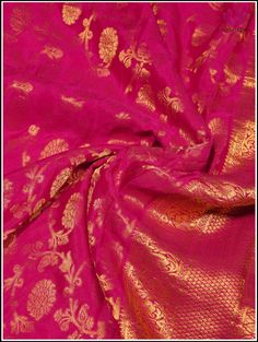 Pink Mysore silk saree with floral brocade is a stunning masterpiece that combines the richness of Mysore silk with exotic floral patterns. The soft pink hue of the silk is complemented by the intricate detailing of the floral brocade, further accentuated by the luxurious sheen of the golden zari. The opulence is further highlighted by a rich golden zari pallu which imparts a regal and grandiose appearance. This combination makes the saree an ideal choice for formal events and celebratory occasi Pink Mysore Silk Saree, Luxury Pink Tussar Silk Saree, Traditional Pink Silk Embroidered Fabric, Luxury Pink Embroidered Raw Silk Fabric, Pink Banarasi Silk Embroidered Fabric, Pure Brocade Mysore Silk Saree, Mysore Silk Saree, Crepe Silk Sarees, Mysore Silk